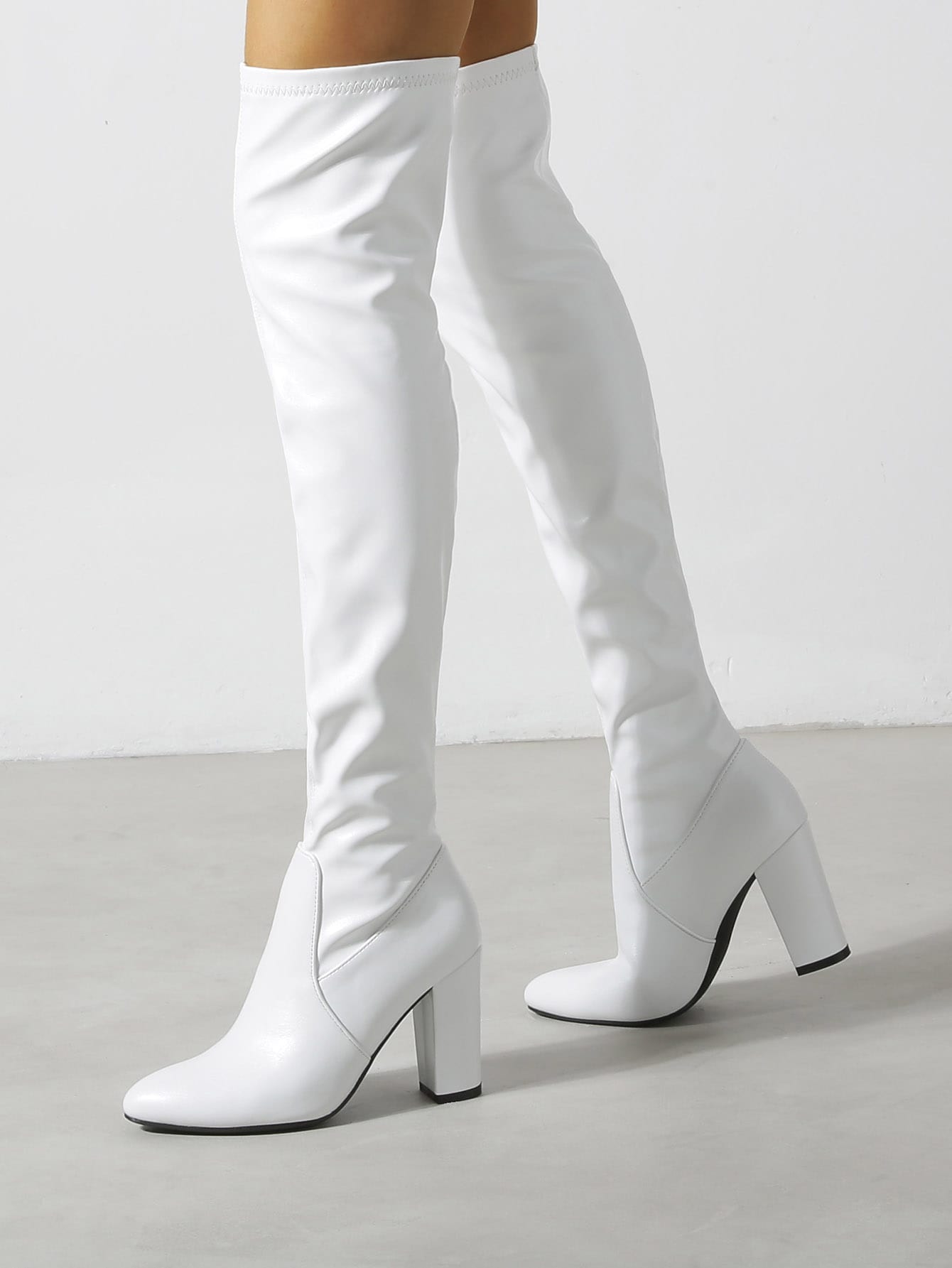 In White Women Over-the-Knee Boots