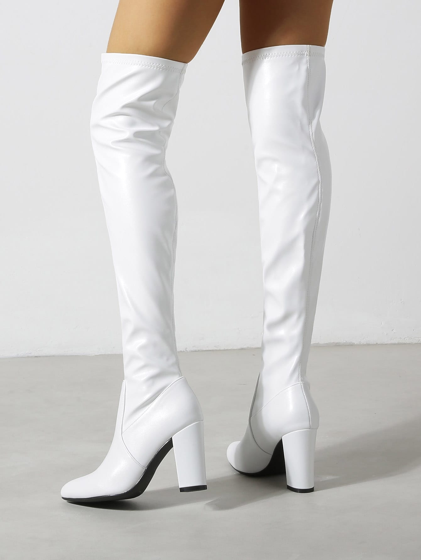 In White Women Over-the-Knee Boots