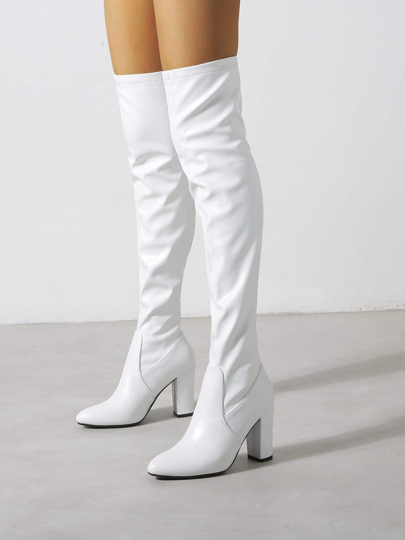 In White Women Over-the-Knee Boots