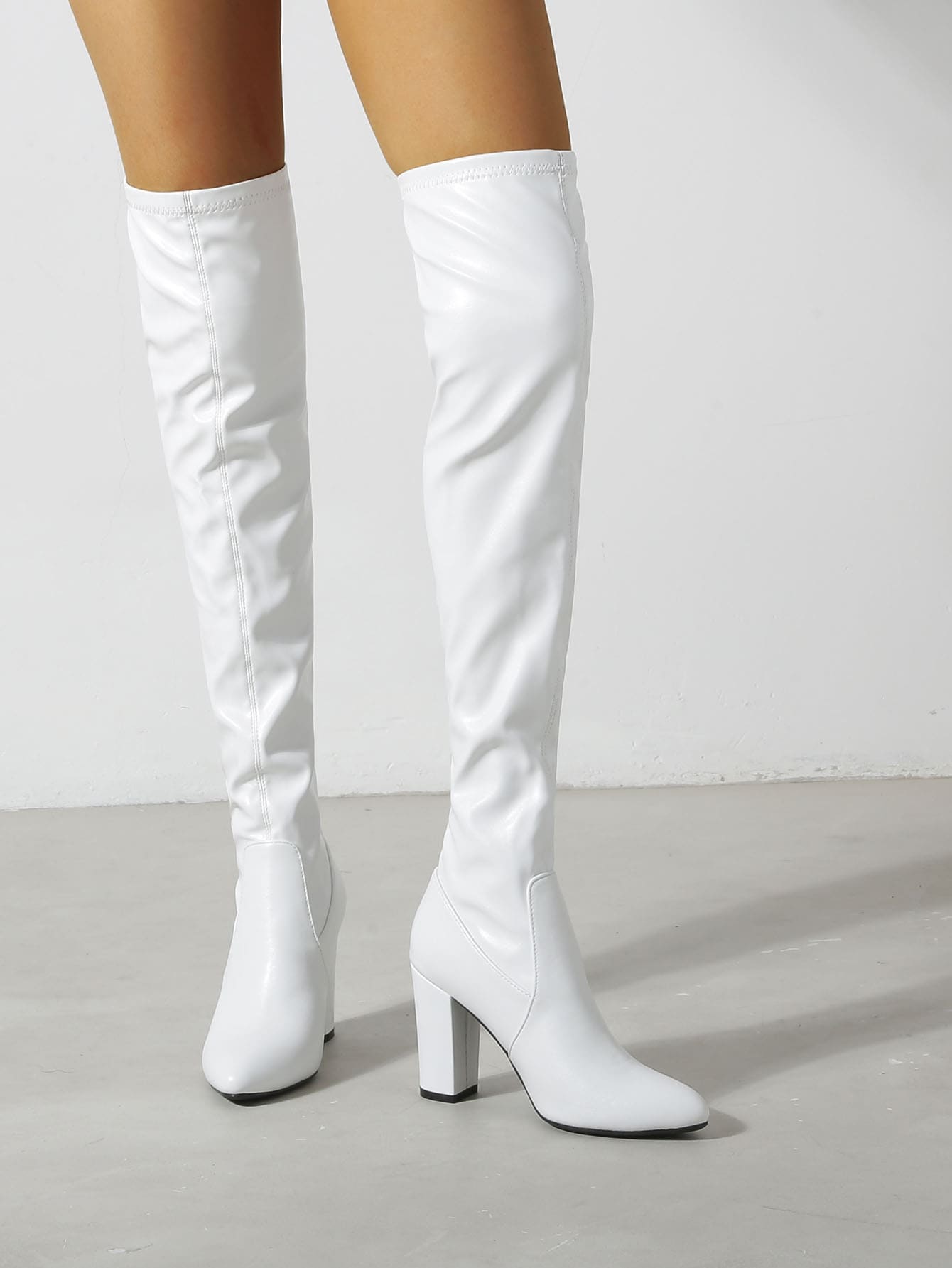 In White Women Over-the-Knee Boots