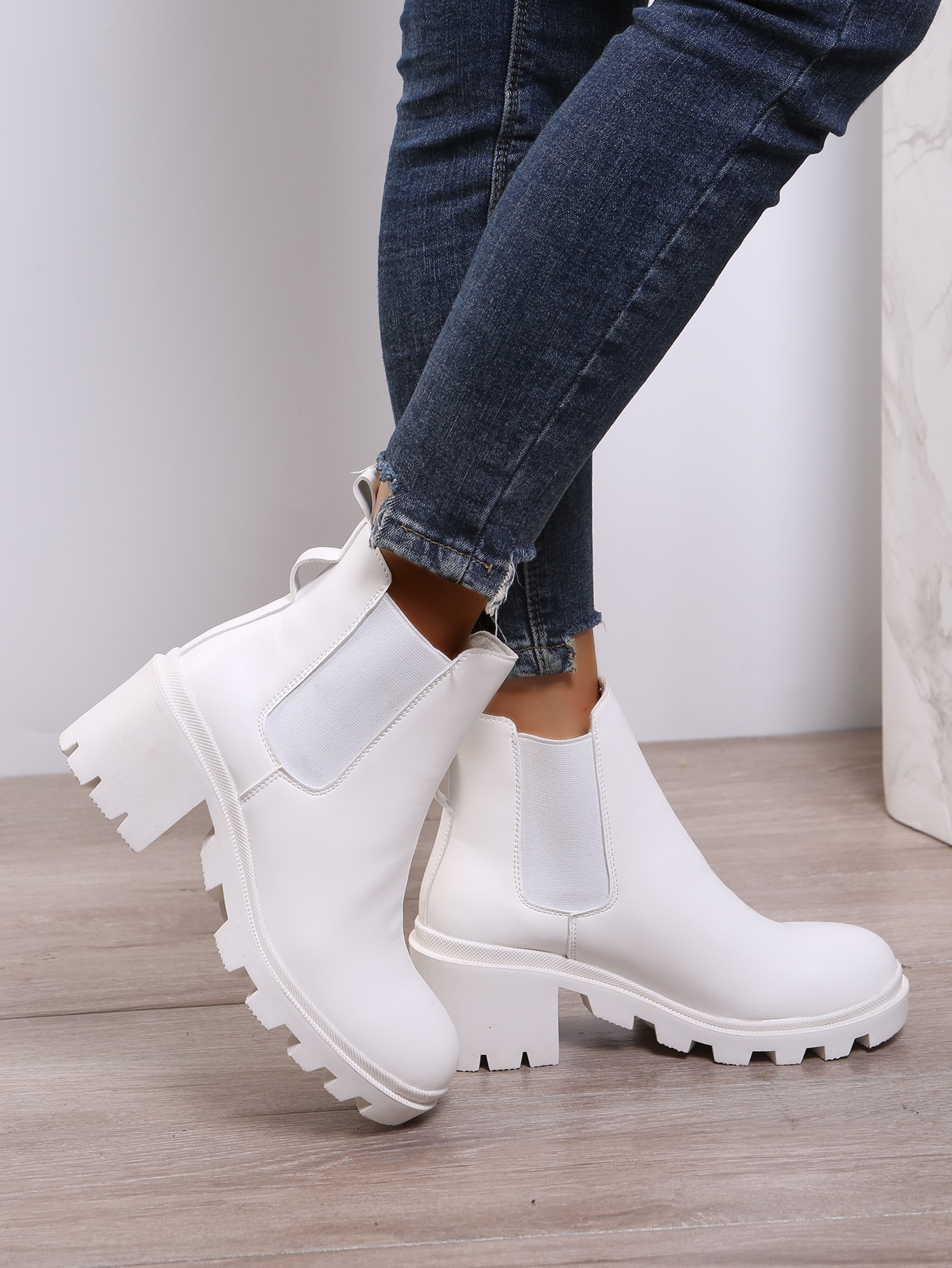 In White Women Ankle Boots & Booties