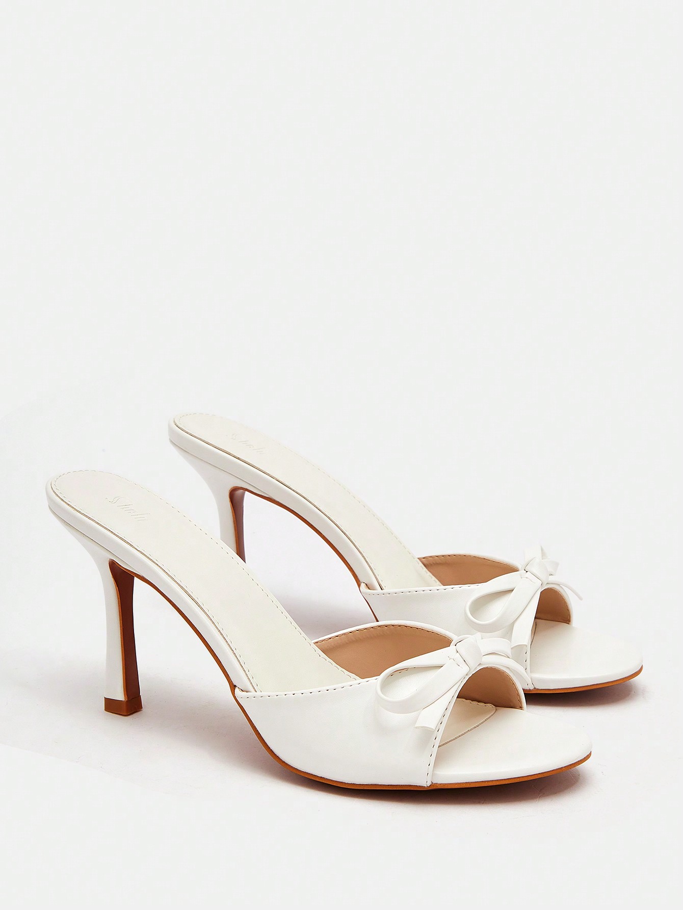 In White Women Heeled Sandals