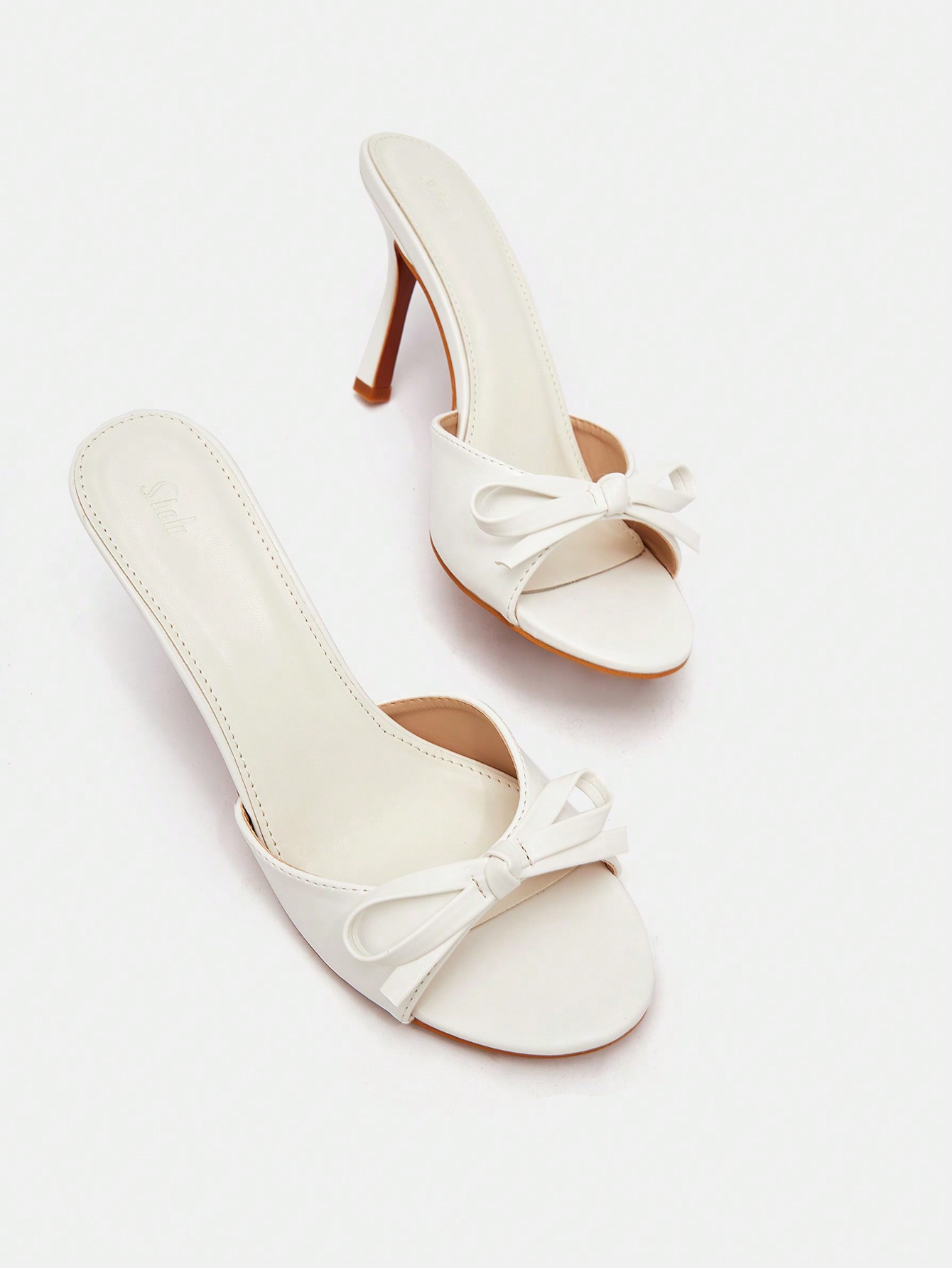 In White Women Heeled Sandals