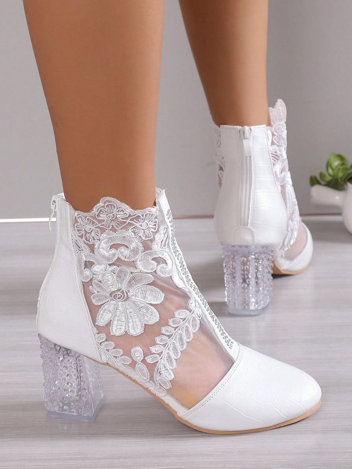 In White Women Ankle Boots & Booties