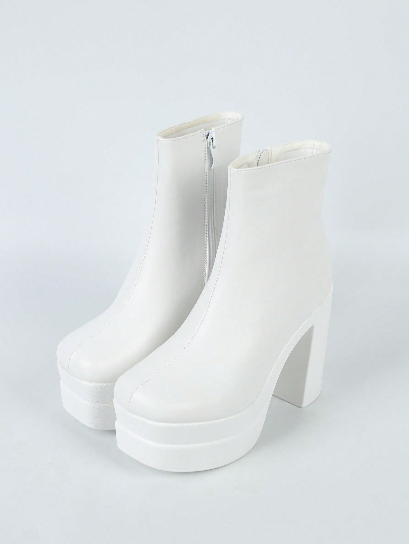 In White Women Ankle Boots & Booties