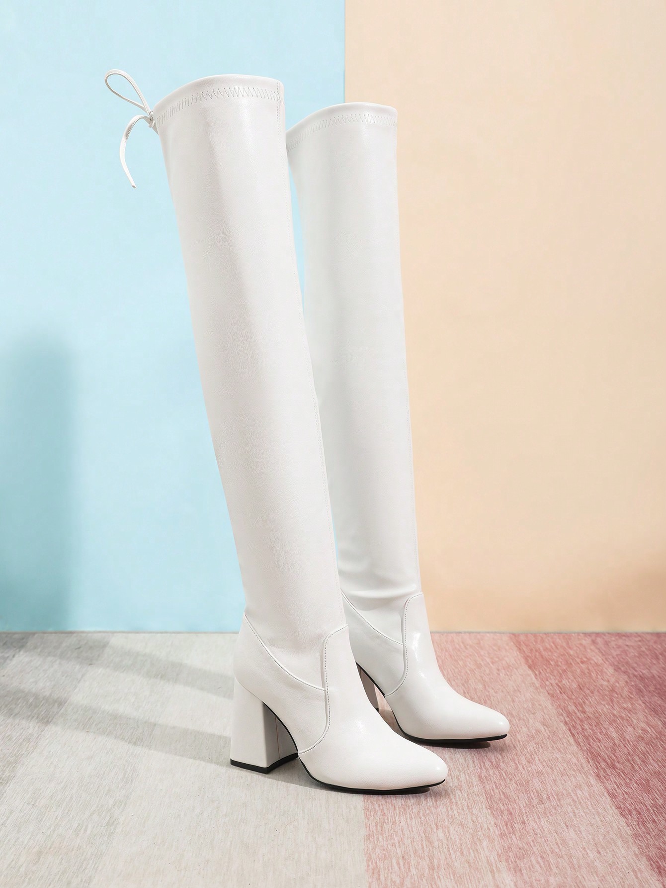 In White Women Over-the-Knee Boots