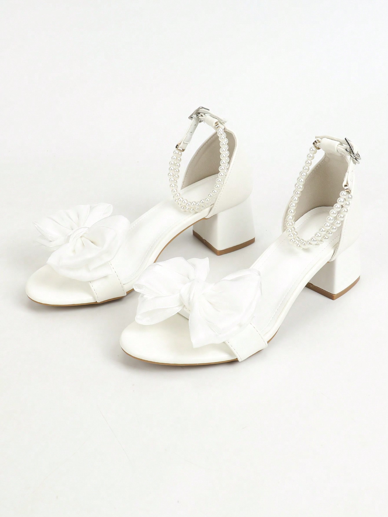 In White Women Heeled Sandals