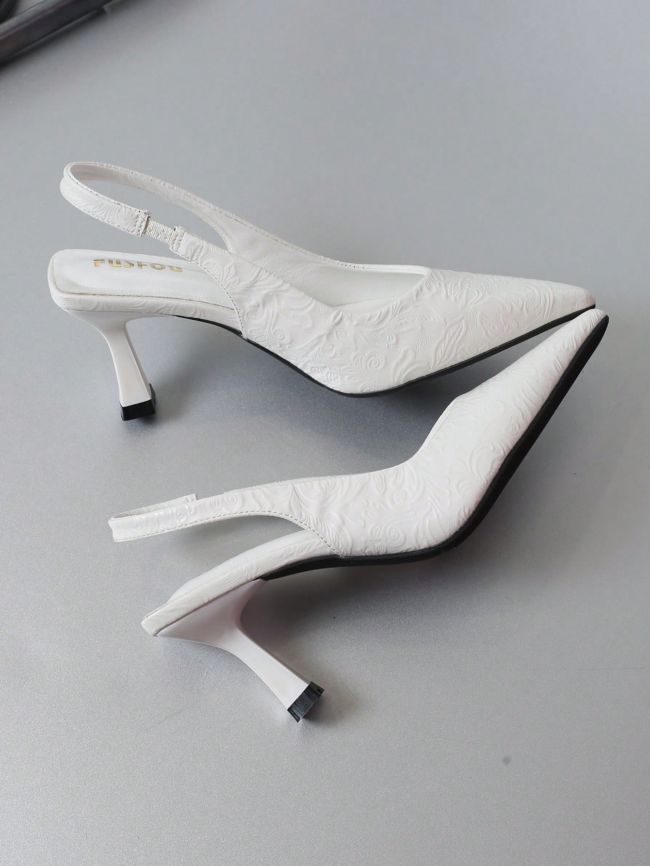 In White Women Pumps