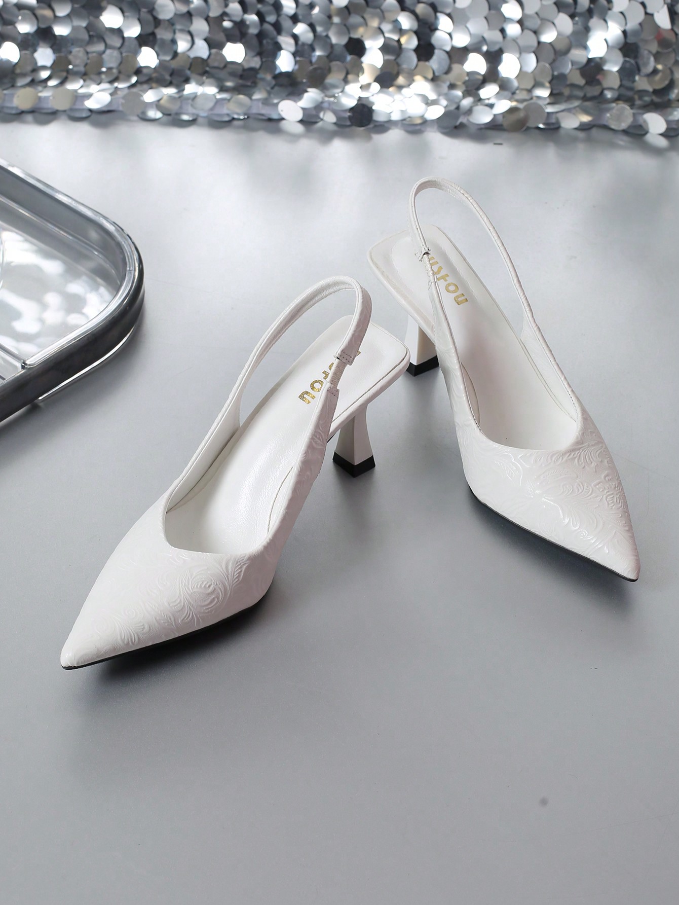 In White Women Pumps