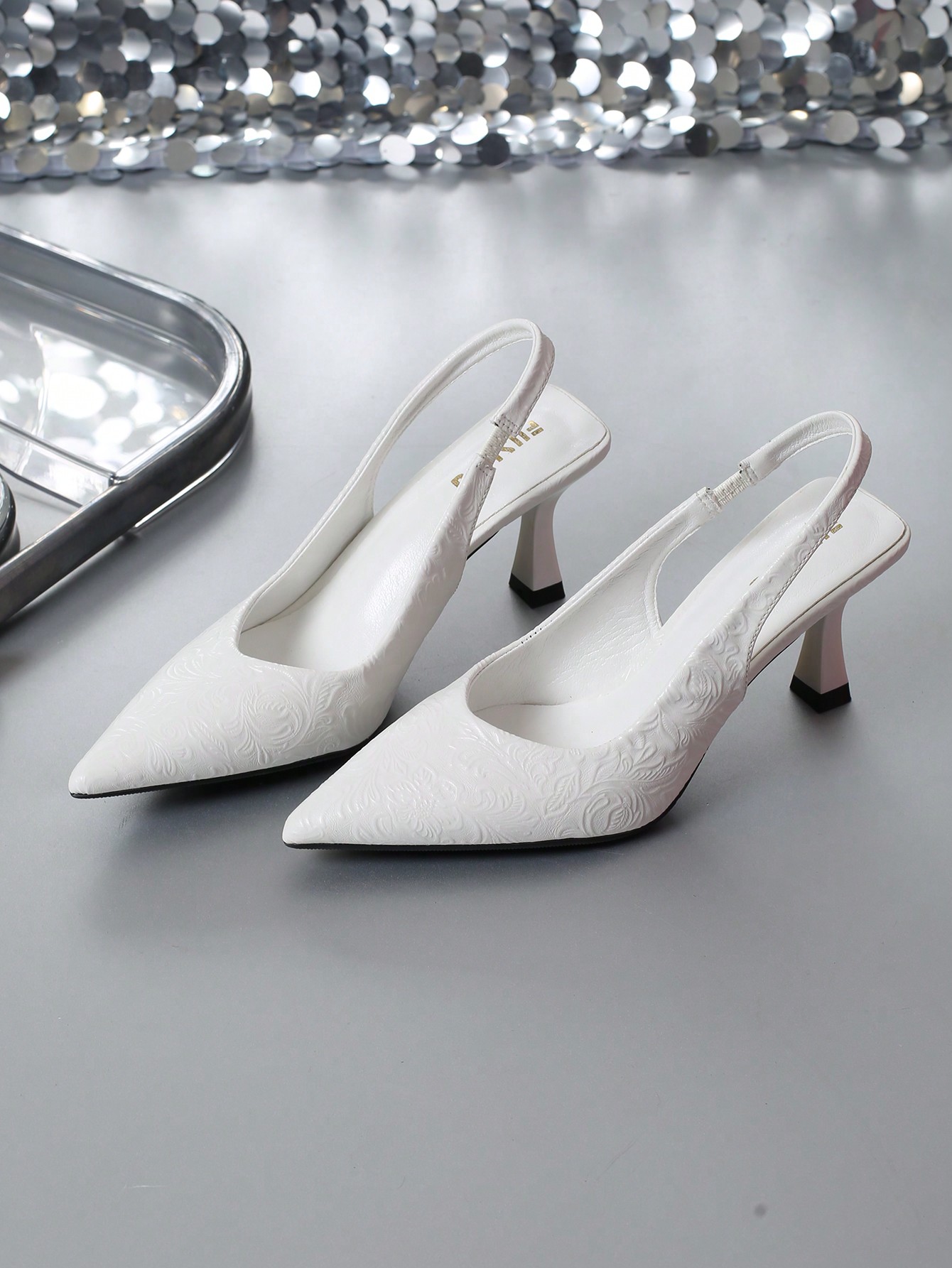 In White Women Pumps