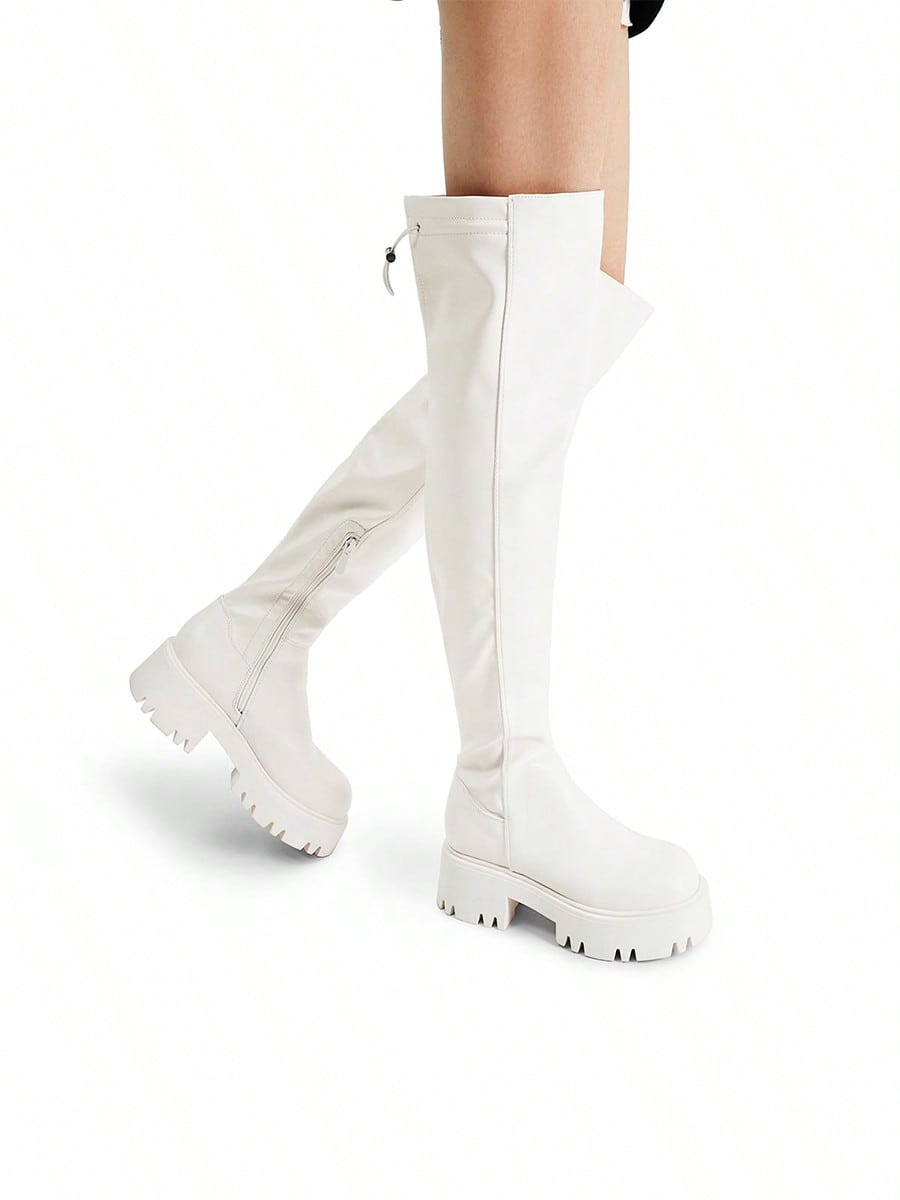 In White Women Over-the-Knee Boots