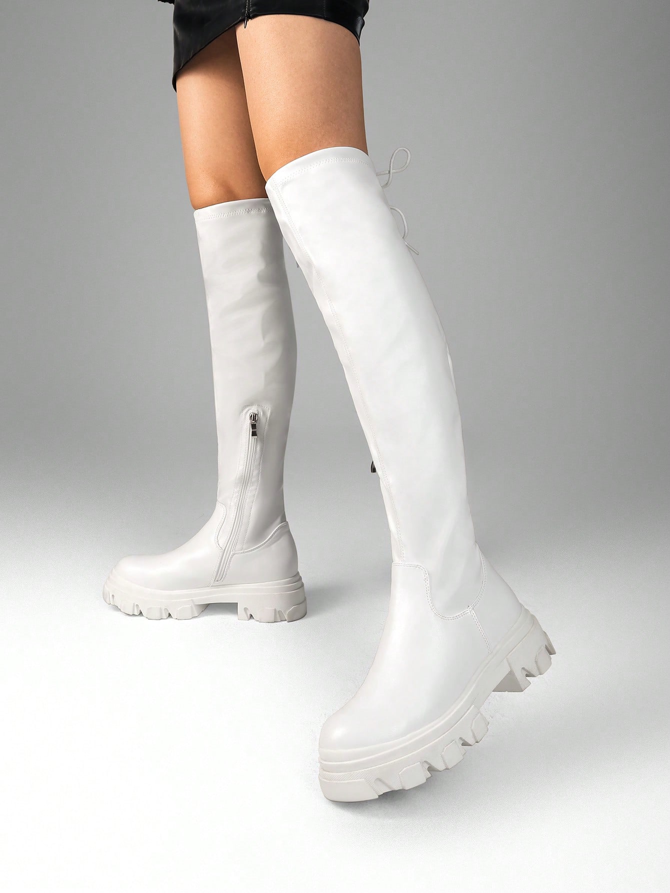 In White Women Over-the-Knee Boots