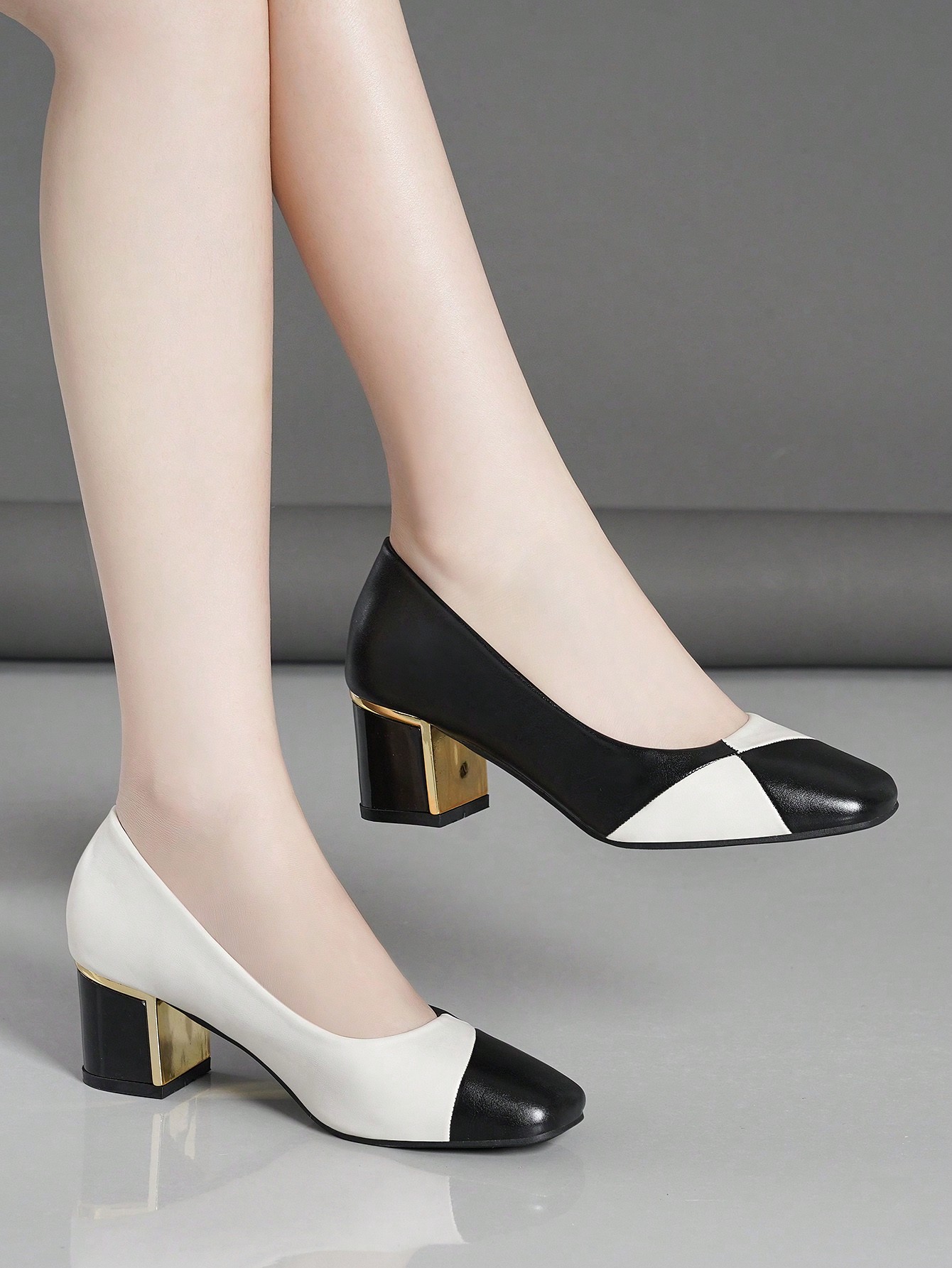 In Black and White Women Pumps