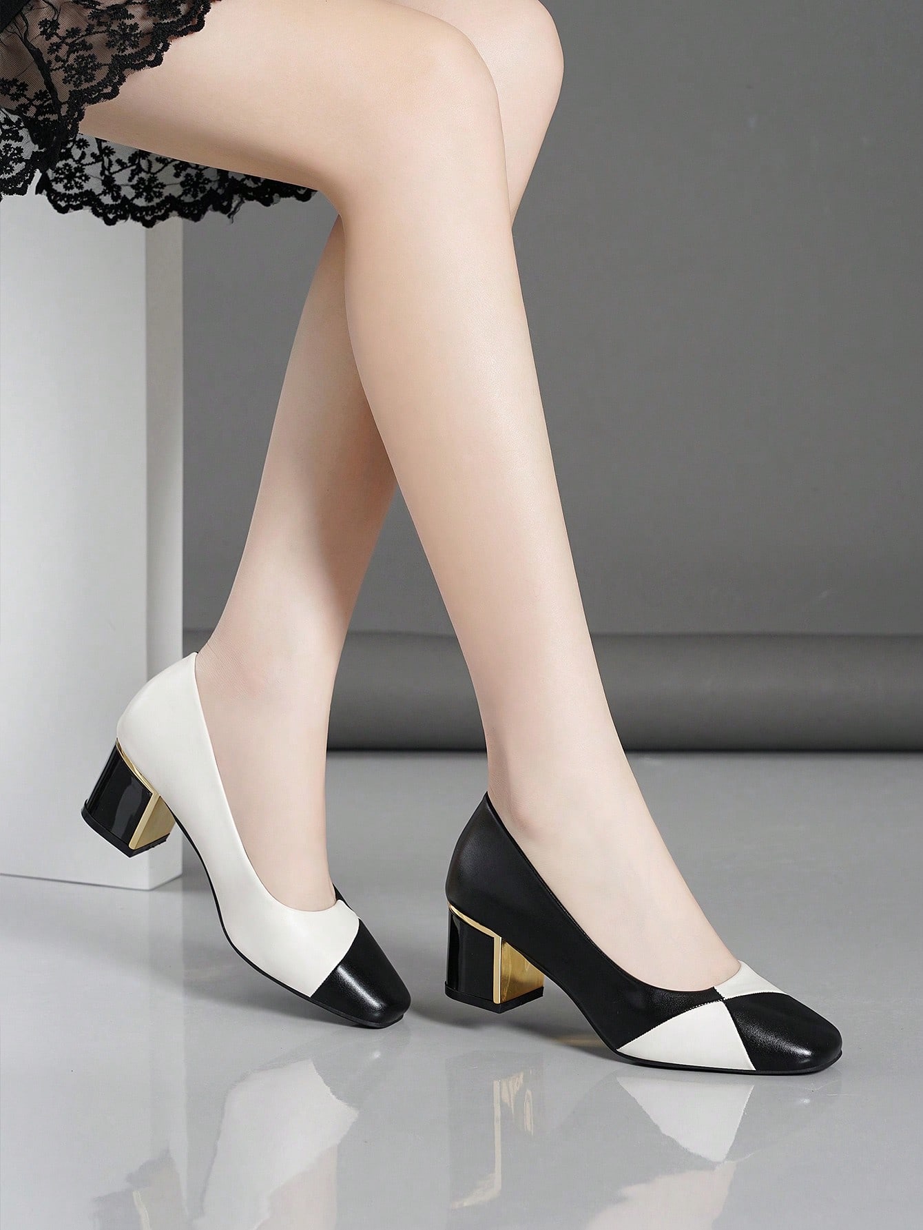 In Black and White Women Pumps