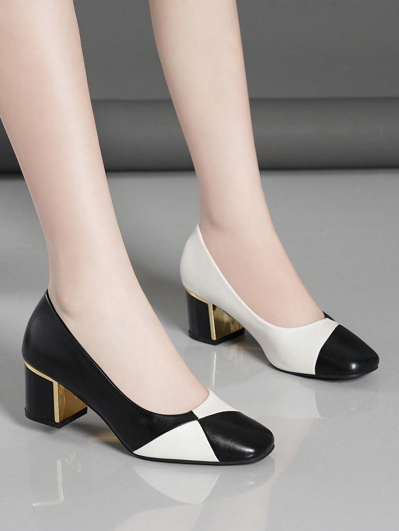 In Black and White Women Pumps