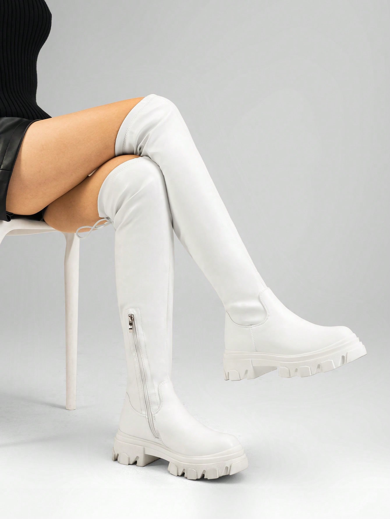 In White Women Over-the-Knee Boots