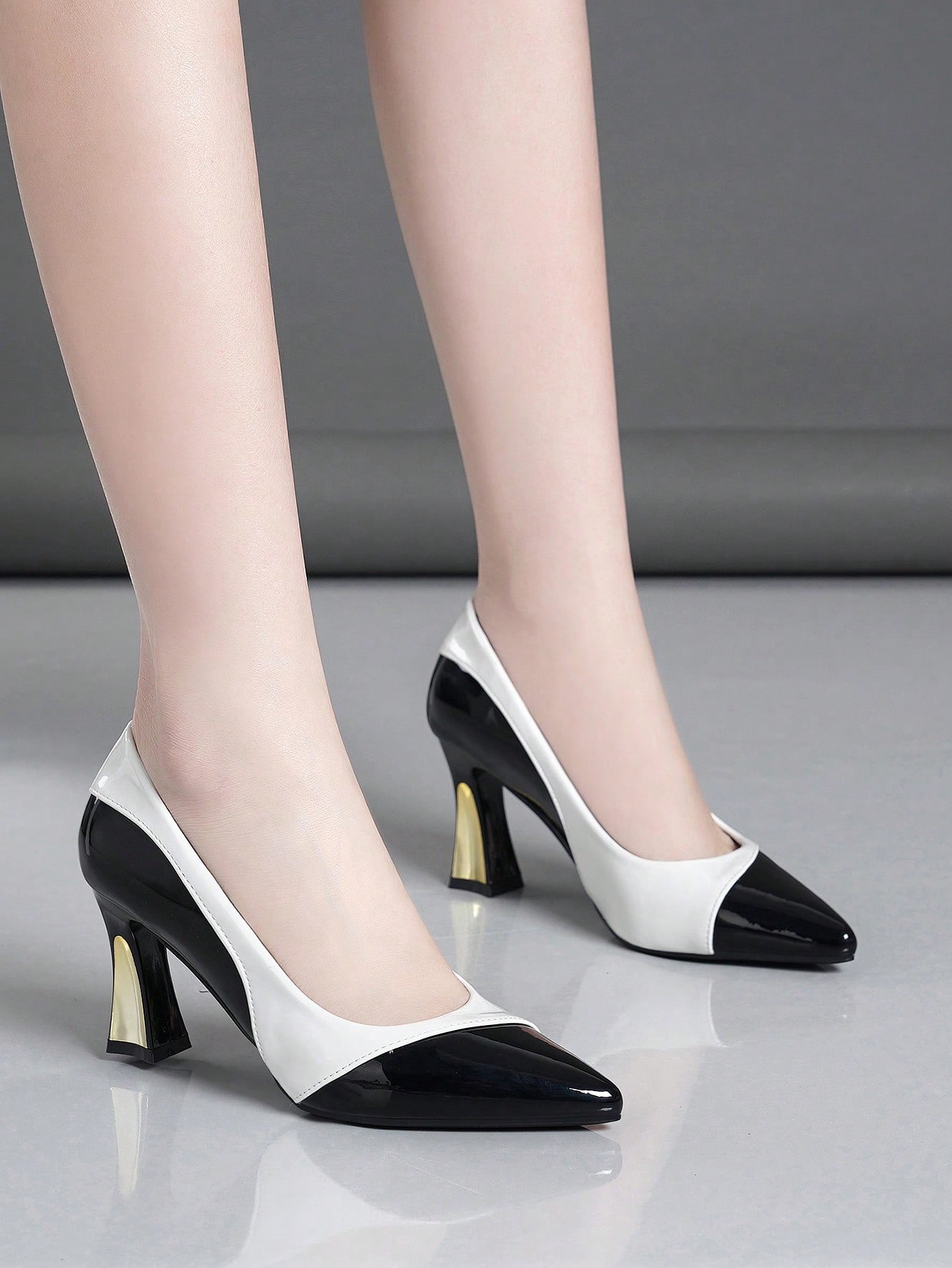 In Black and White Women Pumps