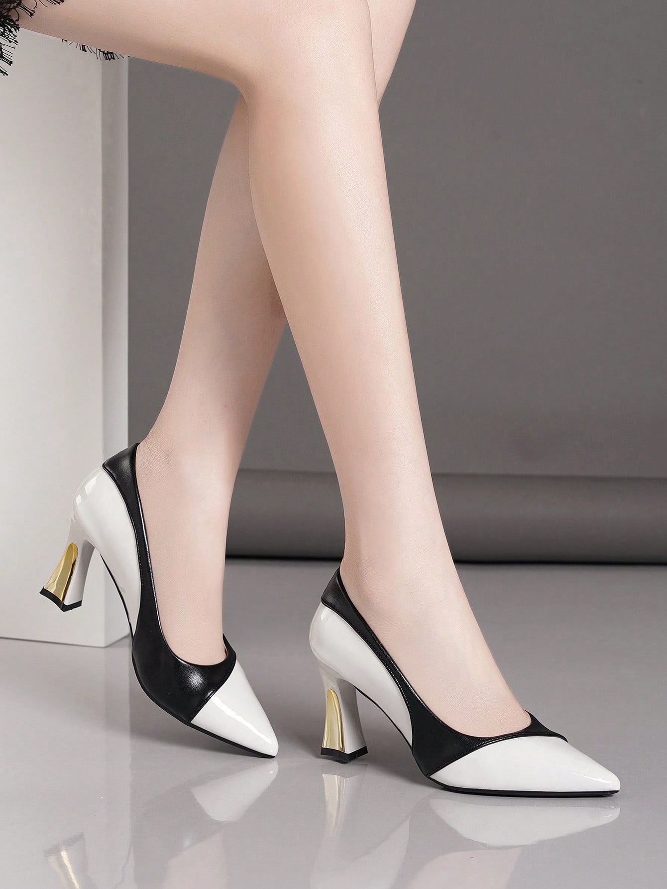 In Black and White Women Pumps