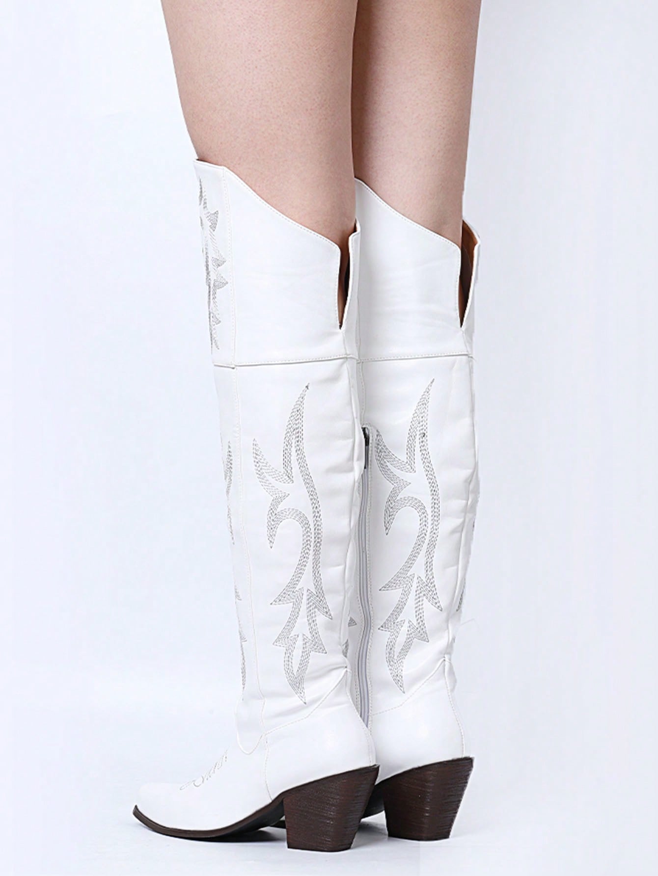 In White Women Over-the-Knee Boots